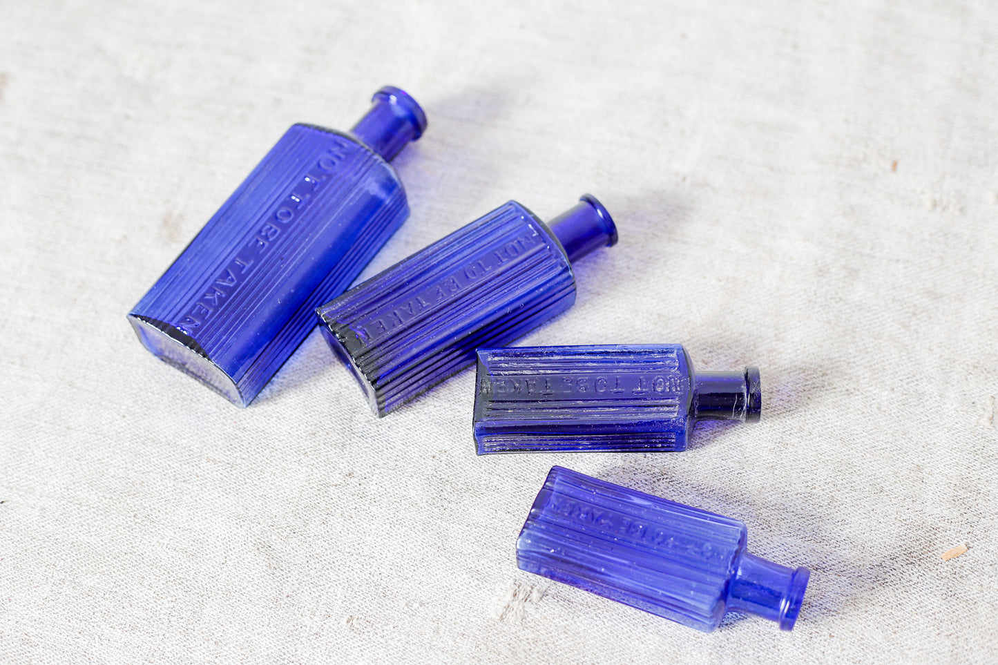 Set of 4 Victorian Cobalt Blue English Poison Bottles, c1900