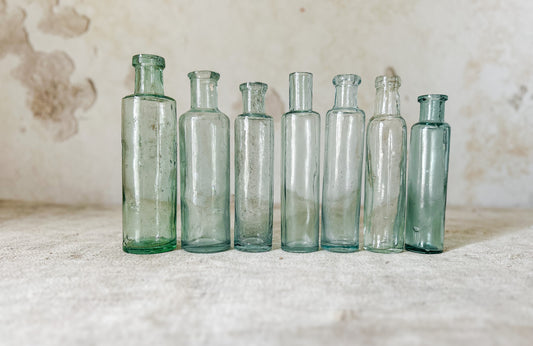 Set of 7 Antique English Aqua Glass Cylinder Bottles