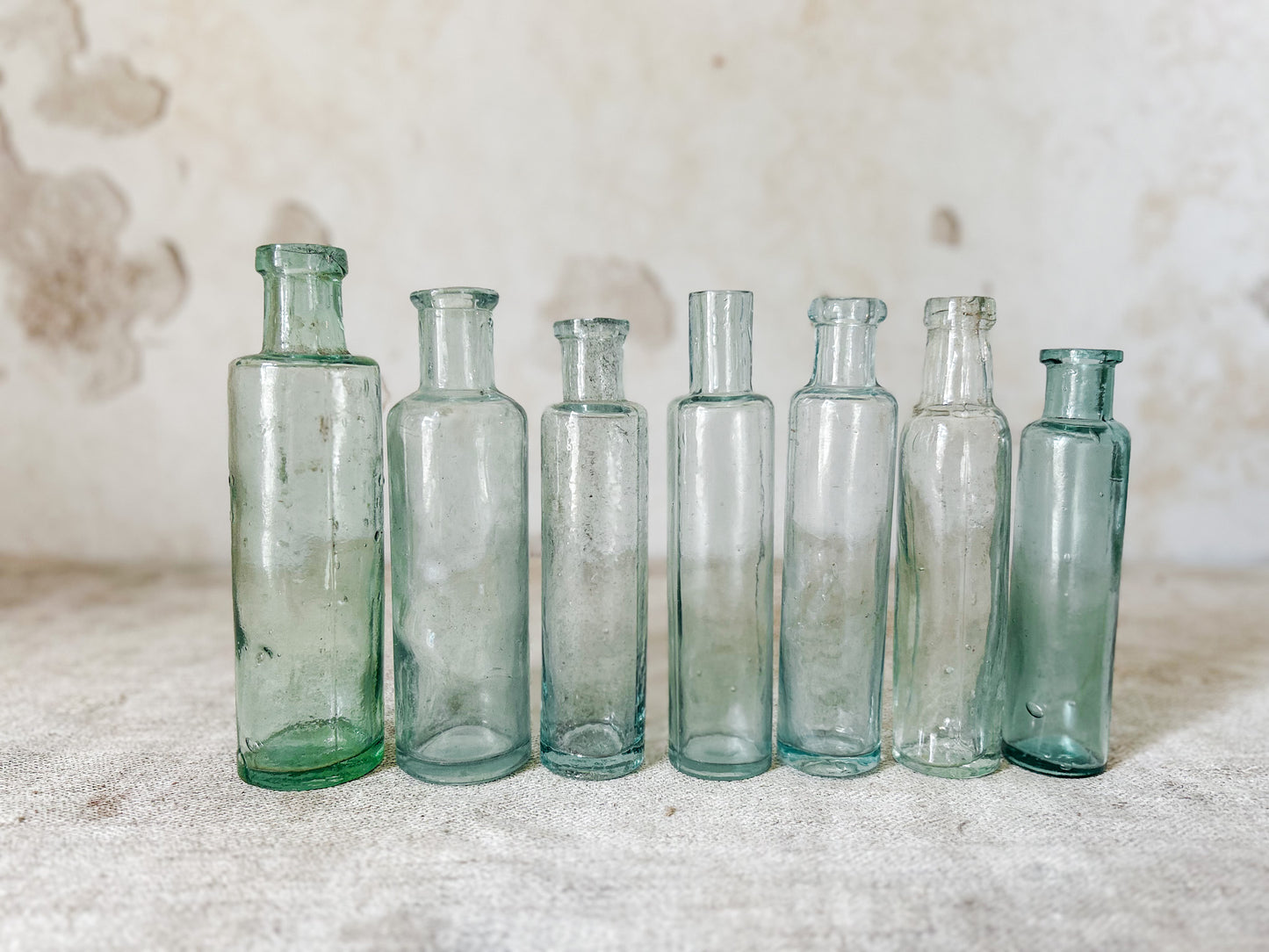 Set of 7 Antique English Aqua Glass Cylinder Bottles