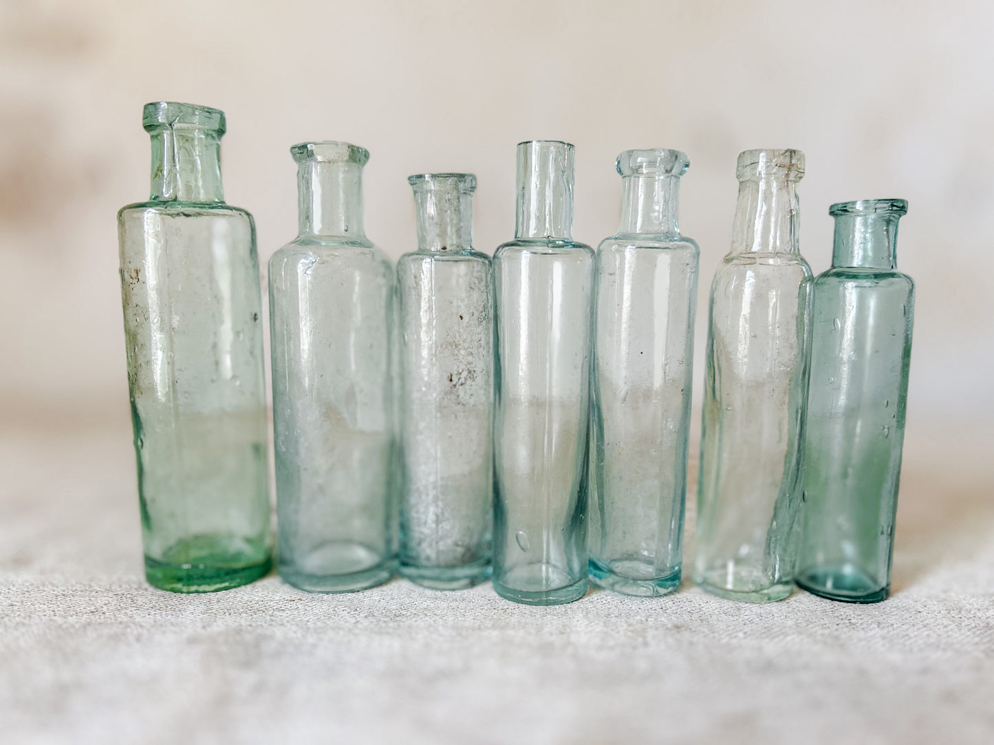 Set of 7 Antique English Aqua Glass Cylinder Bottles
