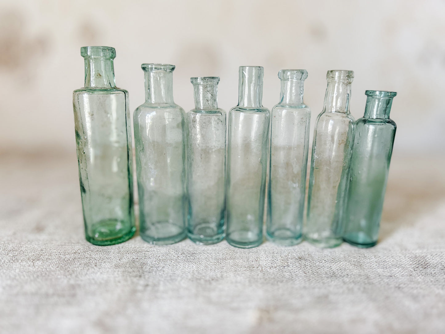 Set of 7 Antique English Aqua Glass Cylinder Bottles