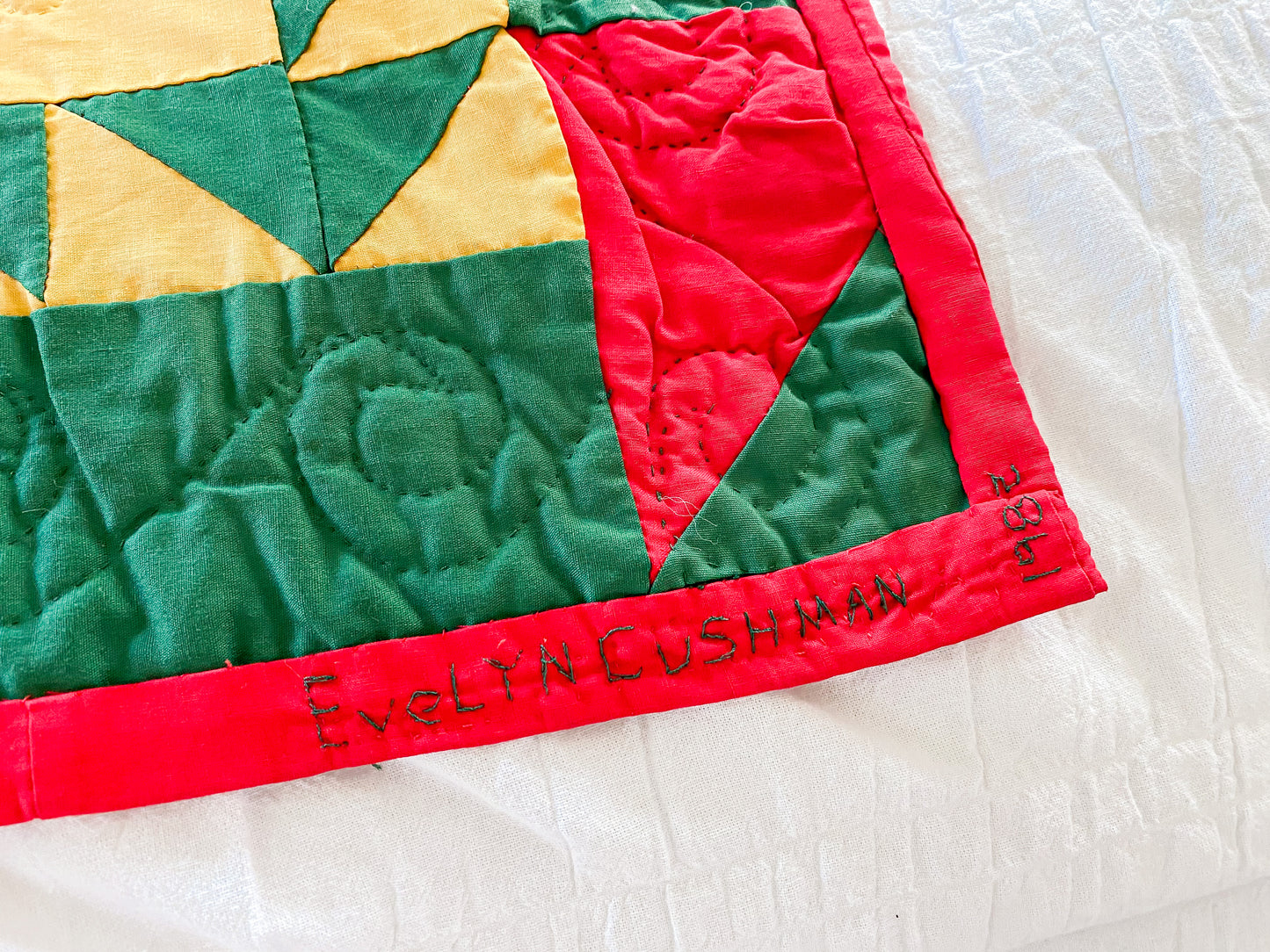 Vintage Quilted Wall Hanging Lap Quilt | Signed Red Yellow Green Broken Star with Sawtooth Border Quilt