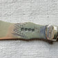 Midcentury Ornate Butter Knife with Carved Handle