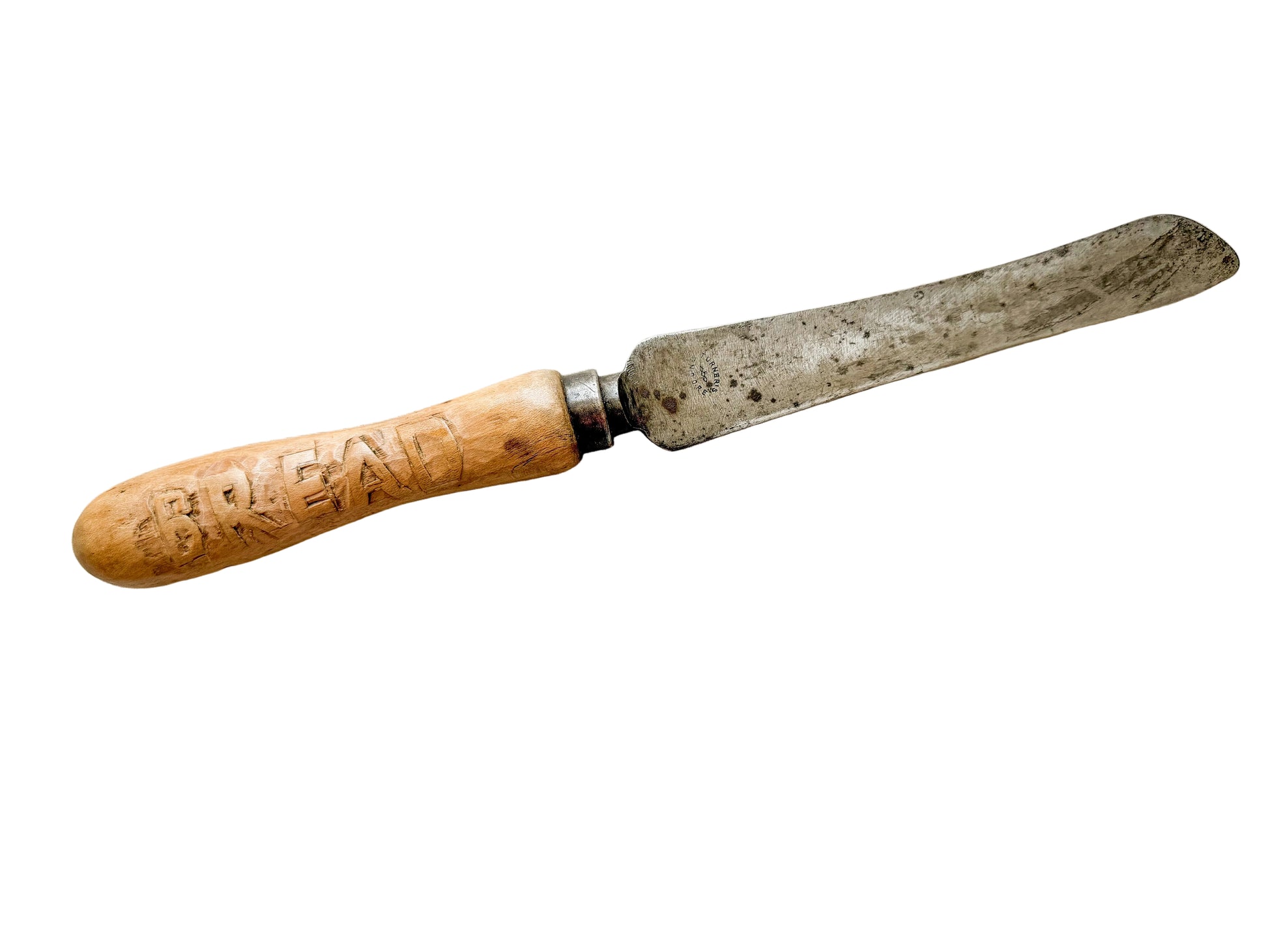 Vintage tool with a wooden handle on a textured beige background