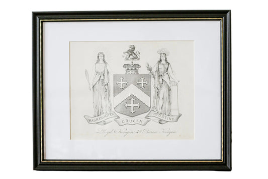 Framed artwork with a coat of arms on a textured wall.