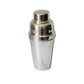A polished silver metal cocktail shaker standing upright on a white marble surface with a matching marble background.