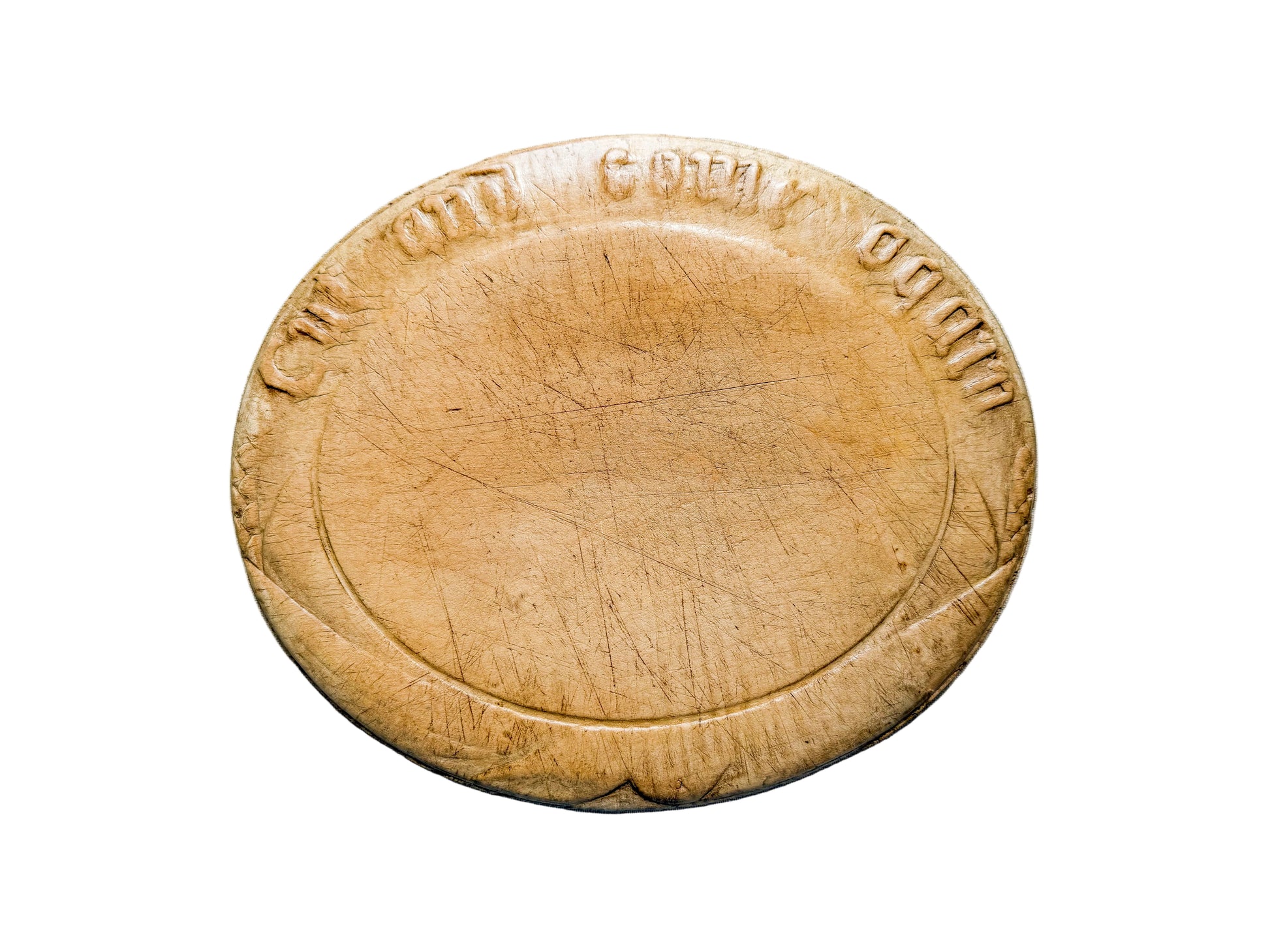 Wooden cutting board with engraved text on a gray surface