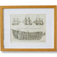 Framed print of a ship diagram on a textured wall.