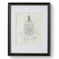 Framed family crest on a textured wall