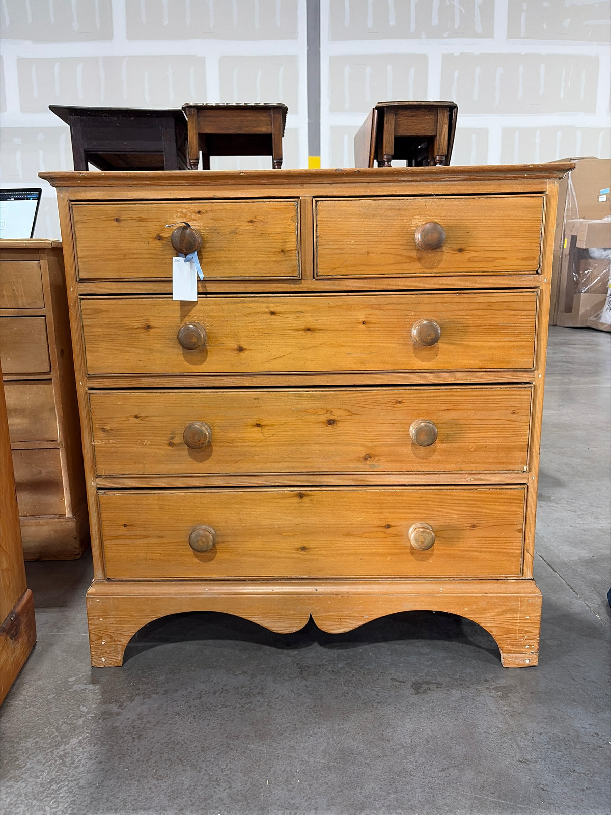 2 over 3 pine chest of drawers with scalloped apron