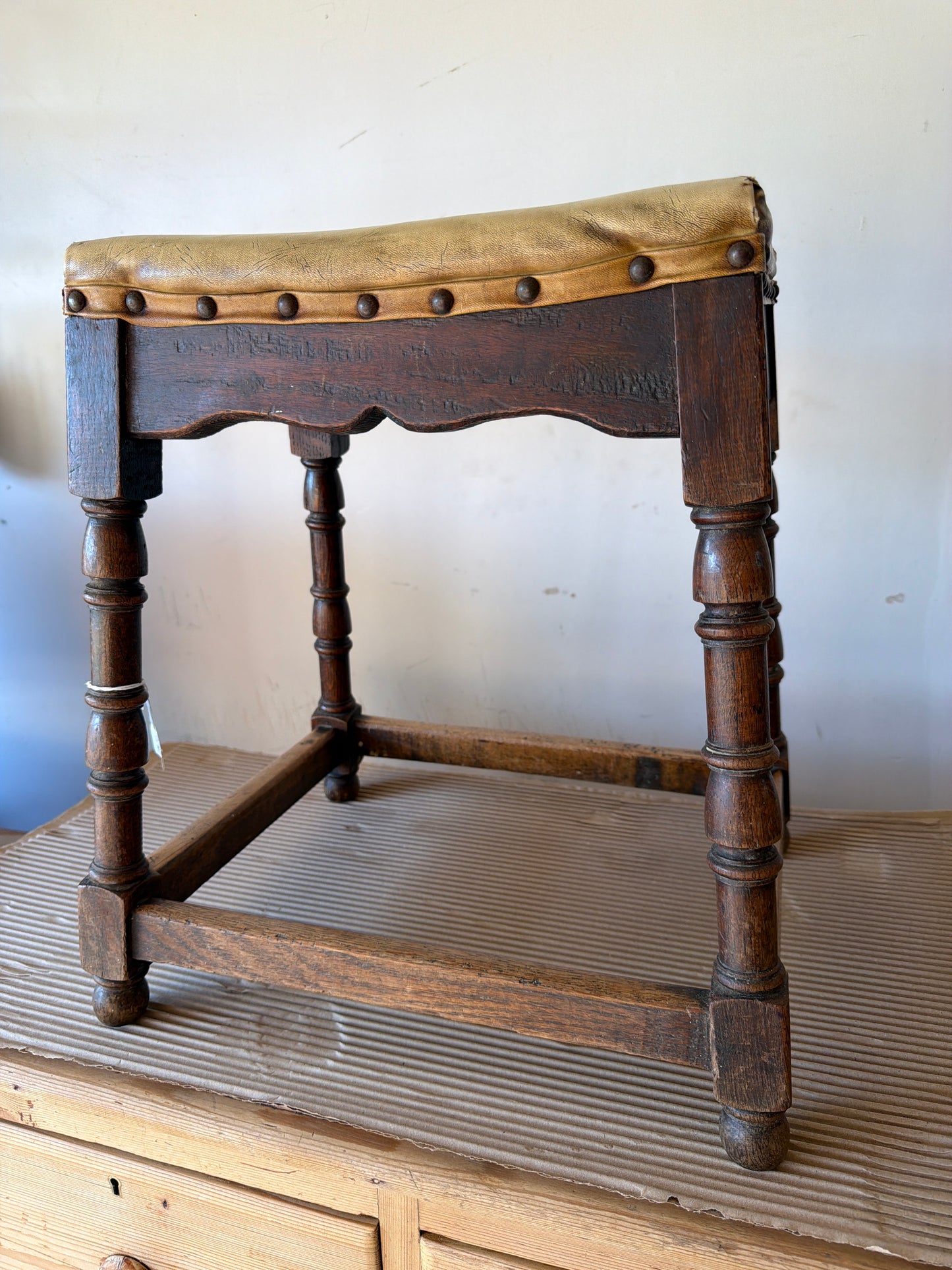Oak joint stool with faux leather top