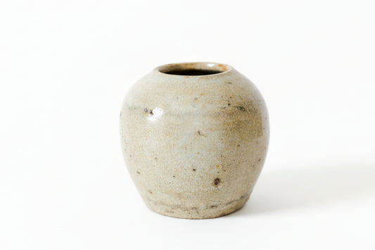 beige ceramic Chinese ginger jar