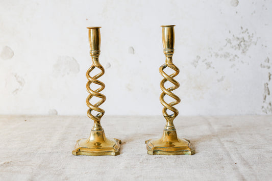 Pair of 19th Century English Cast Brass Open Barley Twist Candlestick Holders with Flared Square Bases