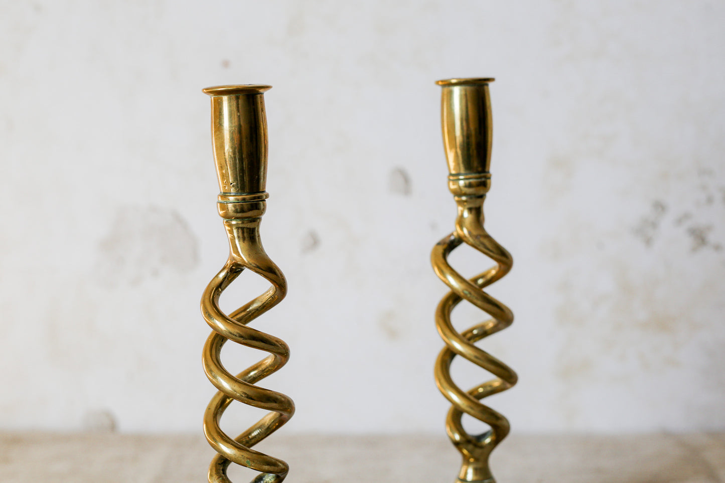 Pair of 19th Century English Cast Brass Open Barley Twist Candlestick Holders with Flared Square Bases