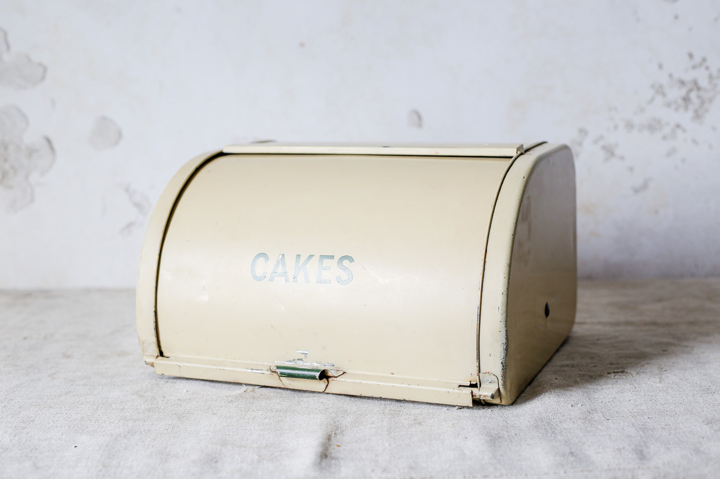 Yellow Metal Roll-Top Cake Countertop Storage Tin, c1940