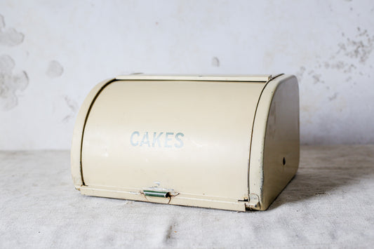 Yellow Metal Roll-Top Cake Countertop Storage Tin, c1940