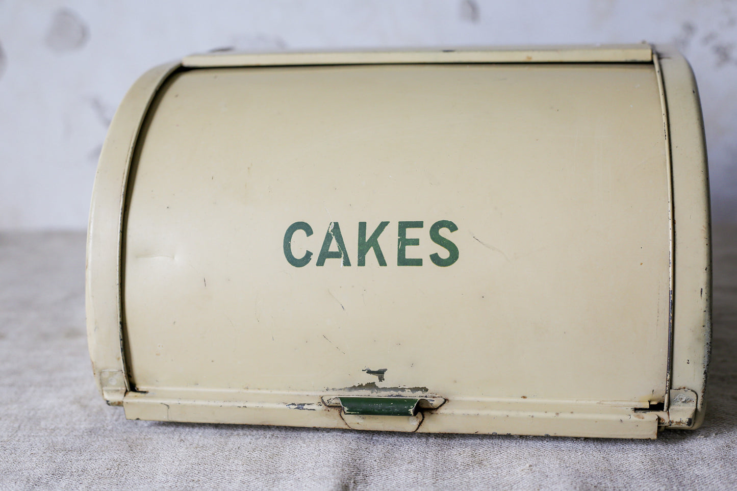 Yellow Metal Roll-Top Cake Countertop Storage Tin, c1940