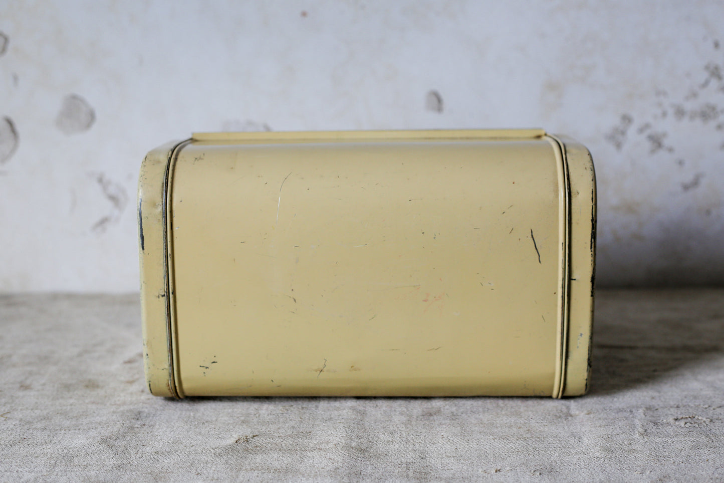 Yellow Metal Roll-Top Cake Countertop Storage Tin, c1940