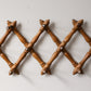 Faux Bamboo Wooden Accordion Wall Rack