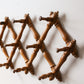 Faux Bamboo Wooden Accordion Wall Rack