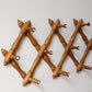 Faux Bamboo Wooden Accordion Wall Rack