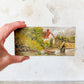 Miniature Painting on Pine of Docked Boat Near Cottage