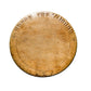 Round wooden cutting board with engraved text on a light gray surface
