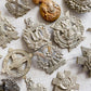 Collection of military badges on a textured surface
