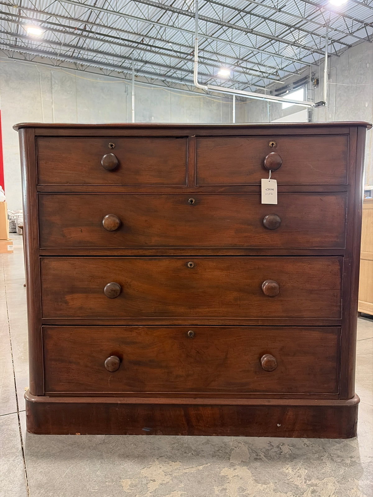 2 over 3 mahogany chest of drawers on plinth