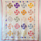Vintage Whirligig Quilt with Sawtooth Border