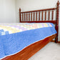 Vintage Around the World Quilt with Blue Border