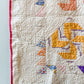 Vintage Whirligig Quilt with Sawtooth Border