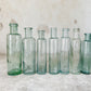 Set of 7 Antique English Aqua Glass Cylinder Bottles