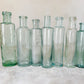 Set of 7 Antique English Aqua Glass Cylinder Bottles