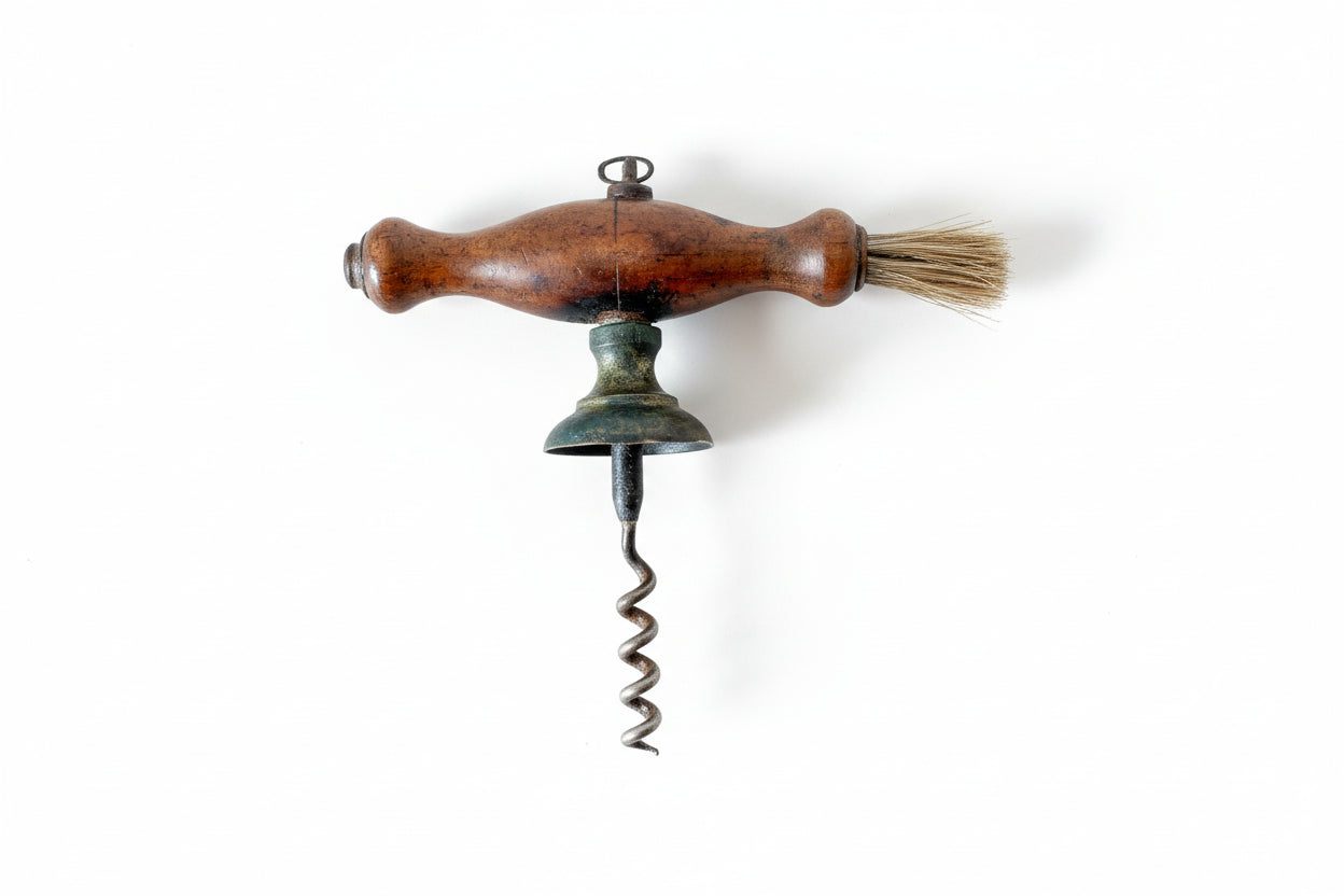 Vintage corkscrew with wooden handle on a textured fabric background