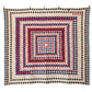 Quilt with geometric pattern on a white background