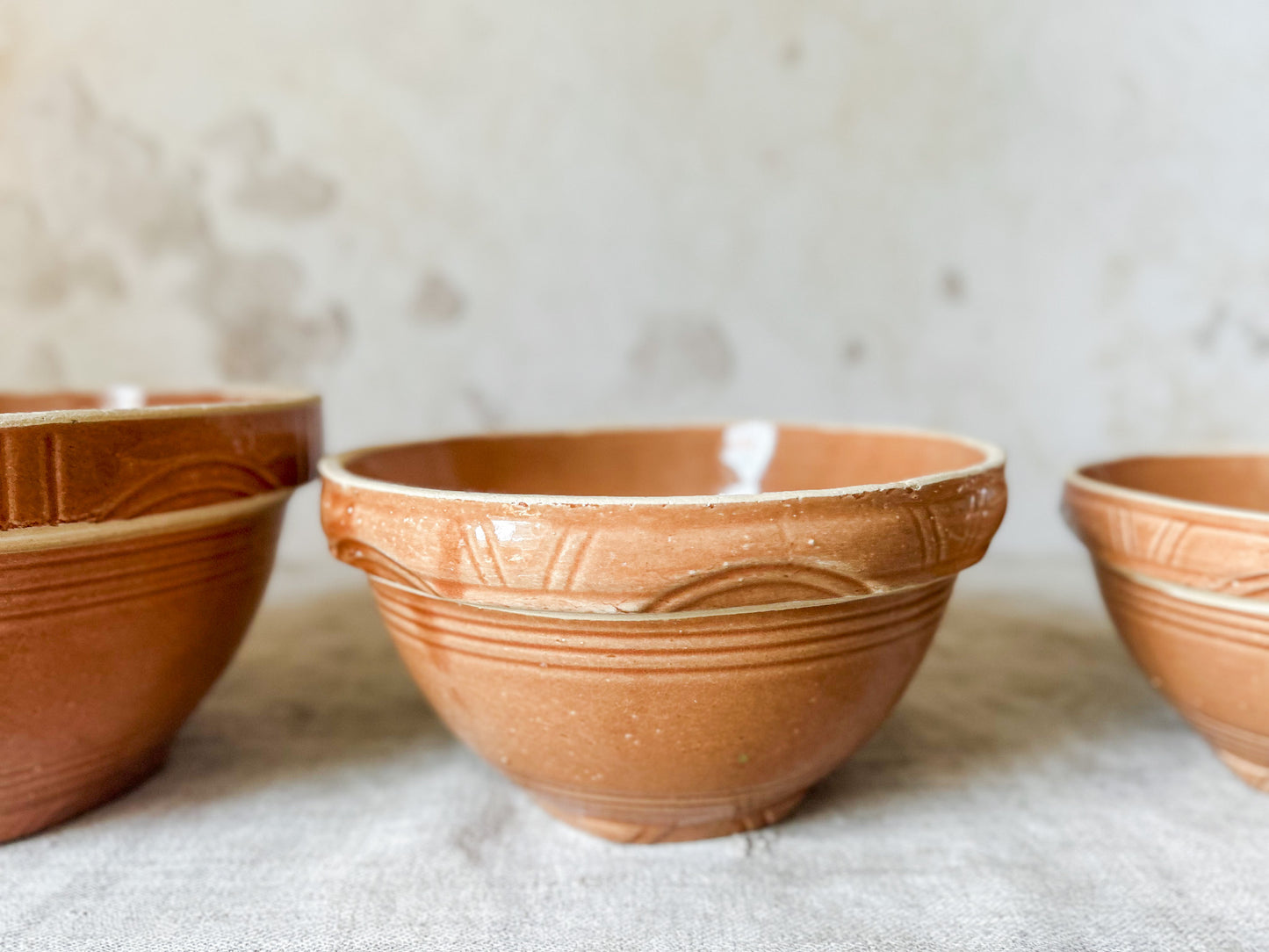 Watt Pottery Arcs Pumpkin Orange Stoneware Mixing Bowl Set of 4, c1940