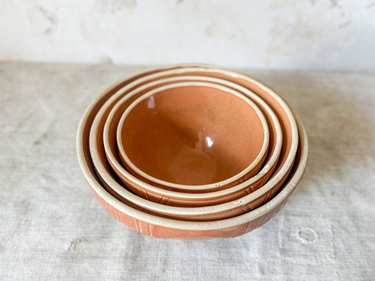 Watt Pottery Arcs Pumpkin Orange Stoneware Mixing Bowl Set of 4, c1940